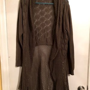 Olive green jacket with scalloped hem